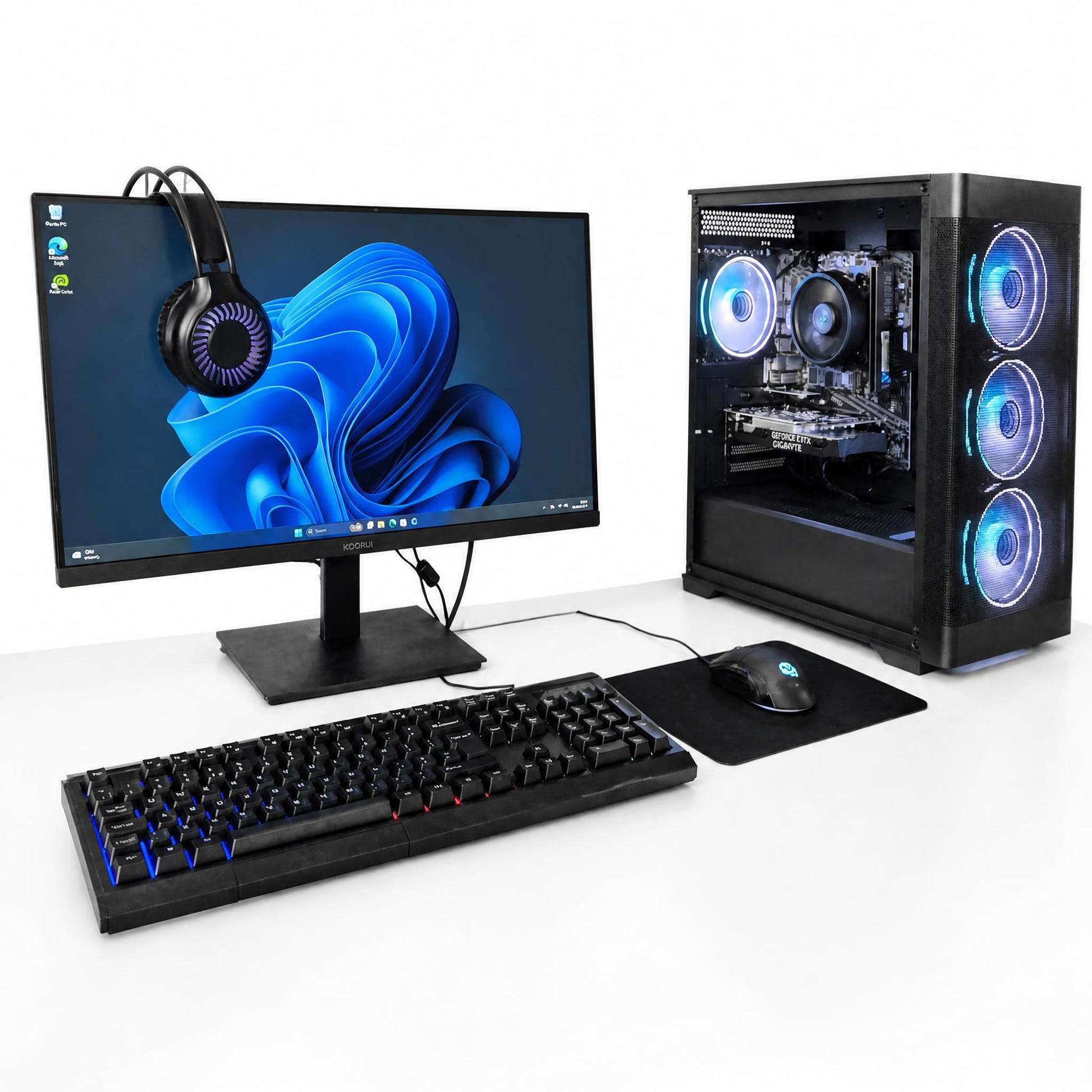 Computer setup with monitor, keyboard, mouse, and high-end gaming PC on a white background