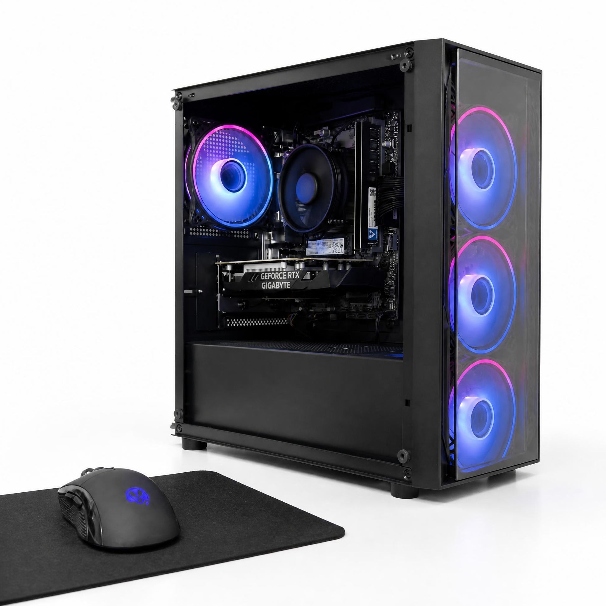 Gaming computer setup with RGB-lit case, mouse, and mouse pad on a white background