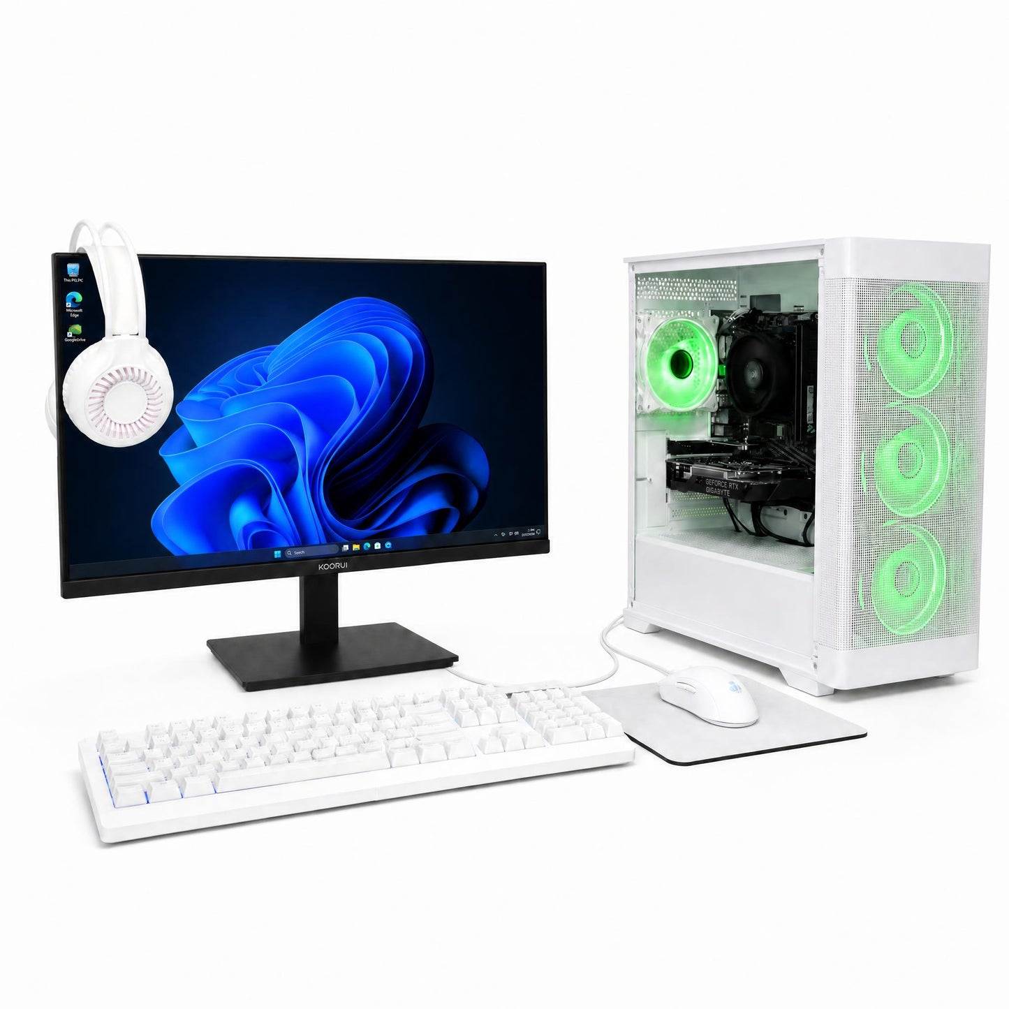 Computer setup with monitor, keyboard, and white gaming headset on a white background
